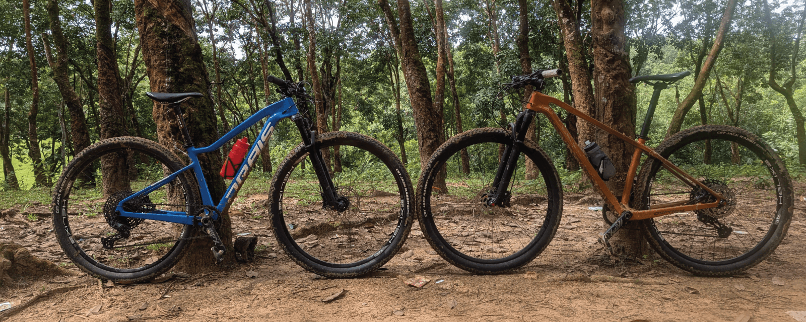 Cyclists riding cross country bikes on a trail